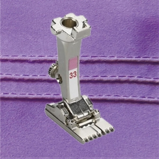Pintuck foot with 9 grooves