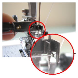 Silver sewing machine needle threader